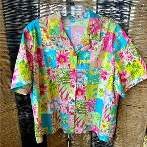 Hawaiian button-down multicolored with floral prints, flamingos, and palm trees